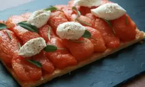 Starter confit tomato tart with goat cheese 